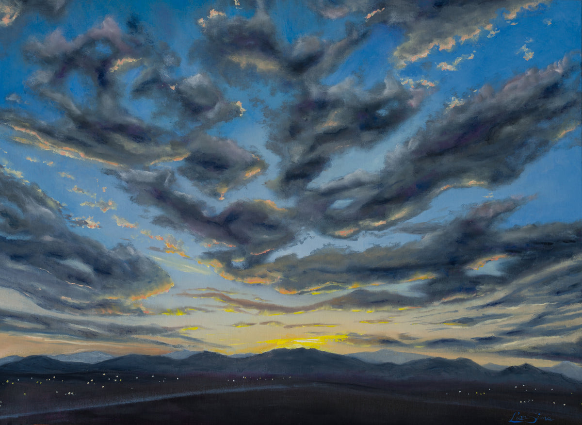 Oil painting of layered evening clouds over distant mountains with warm fading light on the horizon and small lights glowing across the valley.